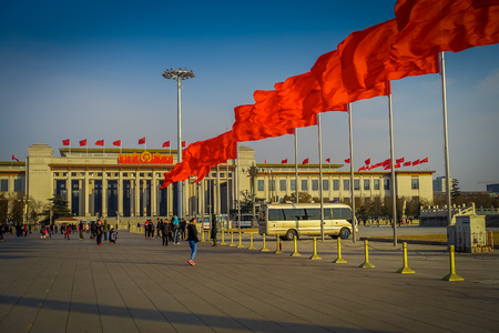 BEIJING, CHINA - 29 JANUARY, 2017: Great hall of the people, spectacular building located on Tianmen square, many red flags, beautiful blue skyのeditorial素材
