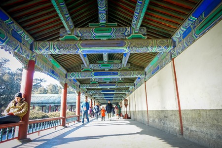 BEIJING, CHINA - 29 JANUARY, 2017: Temple of heaven, imperial complex various religious buildings located in southeastern central city area, walking path with decorated roof structure covering.のeditorial素材