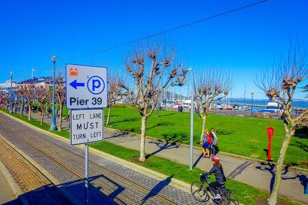 San Francisco, California - February 11, 2017: Beautiful touristic view of the bayside pier in the popular and cultural downtown area.のeditorial素材