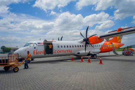 George Town, Malaysia - March 10, 2017: Firefly airplane in Penang Airport, subsidiary of Malaysia Airlines, flag carrier of Malaysia.のeditorial素材