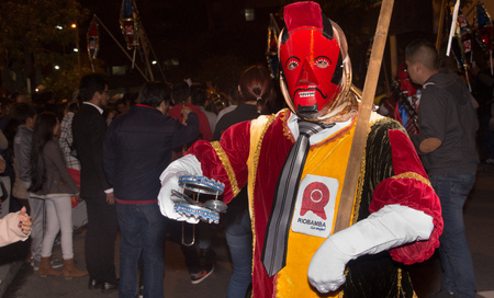 Quito, Ecuador - December 09, 2016: An unidentified people dressed up participating in the Diablada, popular town celebrations with people dressed as devil dancing in the streetsのeditorial素材