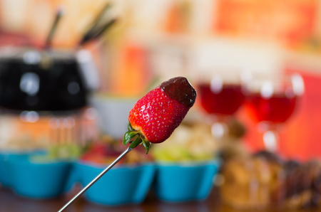 Delicious strawberry with chocolate, fondue concept with a blurred backgroundの写真素材