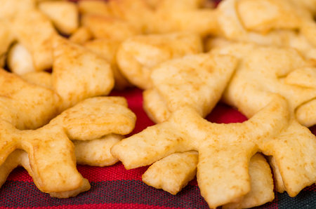Closeup of delicious ecuadorian pristinos, piled up fresh from the fryer, traditional andean pastry...