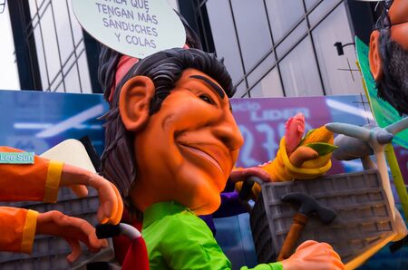 Quito, Ecuador - December 31, 2016: Traditional monigotes or stuffed dummies representing political figures, anime or famous cartoons, with a short description that will get burned to celebrate new year in Ecuadorのeditorial素材