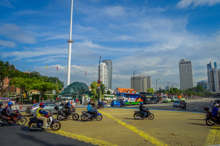 Kuala Lumpur, Malaysia - March 9, 2017: Malaysia flag waving tall in Merdaka Square, in the city downtown.のeditorial素材