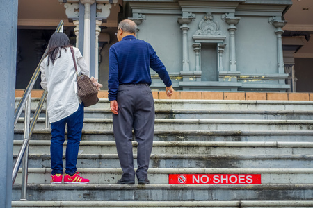 Kuala Lumpur, Malaysia - March 9, 2017: Entrance to Batu Caves, a limestone hill with big and small caves and cave temples and a very popular Hindu shrine outside India.のeditorial素材