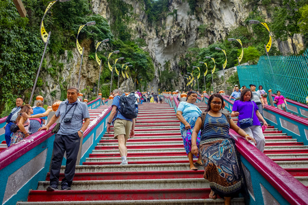 Kuala Lumpur, Malaysia - March 9, 2017: Entrance steps to Batu Caves, a limestone hill with big and small caves and cave temples and a very popular Hindu shrine outside India.のeditorial素材