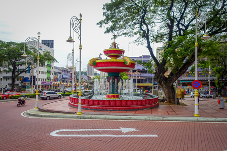 Kuala Lumpur, Malaysia - March 9, 2017: Ganesh elphant water fountain in Little India neighborhood, recently transformed into a wide street with Indian stores and restaurants.のeditorial素材