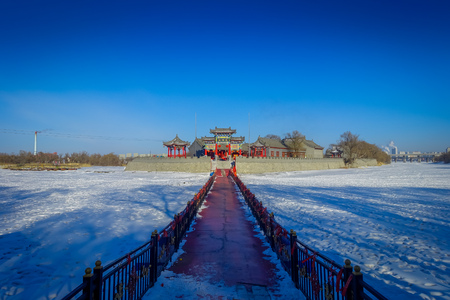 Harbin, China - February 9, 2017: Classic buddhist temple in winter located in Sun Island Park.のeditorial素材