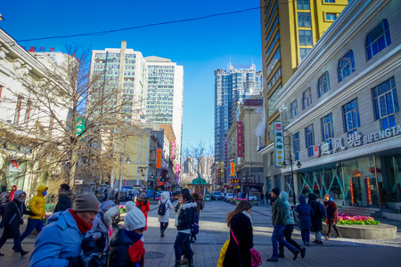 Harbin, China - February 9, 2017: Zhongyang pedestrian street, central street is a popular and commercial long corridor of European architectural art.のeditorial素材