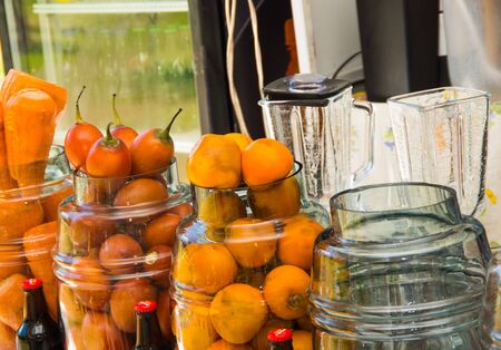 Fresh fruits and vegetable inside of a glass jar on sunday marketの写真素材