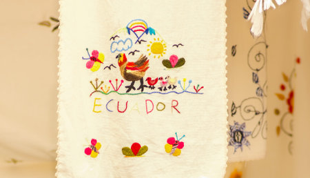 OTAVALO, ECUADOR - MAY 17, 2017: Beautiful andean textile yarn and woven by hand in wool, in white...
