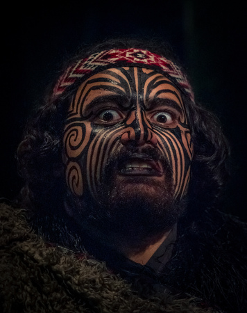 NORTH ISLAND, NEW ZEALAND- MAY 17, 2017: Portrait of Tamaki Maori leader man with traditionally tatooed face in traditional dress at Maori Culture, Tamaki Cultural Village, Rotorua, New Zealandのeditorial素材