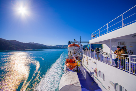 SOUTH ISLAND, NEW ZEALAND- MAY 25, 2017: Unidentified people enjoying the beautiful view from South island to North island at ferry in New Zealandのeditorial素材