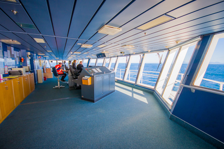 SOUTH ISLAND, NEW ZEALAND- MAY 25, 2017: Ferry boat pilot command cabin with the captain operating the machines with a two assistants, in new zealandのeditorial素材