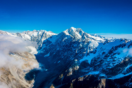 A Wide Panorama of Snowy Mountains, Southern Alps located in south island, in New Zealandの写真素材
