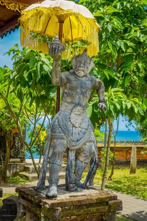 BALI, INDONESIA - MARCH 05, 2017: Stoned statue of king monkey in the enter of Pura Ulun Danu Bratan temple on Bali island, Indonesiaのeditorial素材