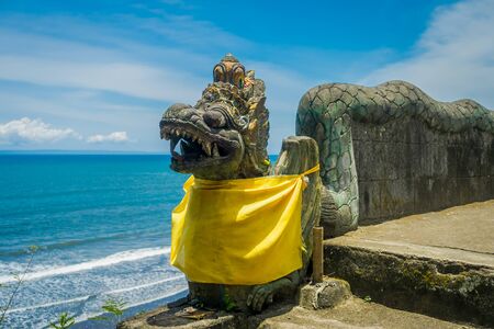 BALI, INDONESIA - MARCH 05, 2017: Stoned dragon statue of Pura Ulun Danu Bratan temple on Bali island, Indonesiaのeditorial素材