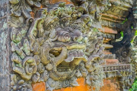 BALI, INDONESIA - MARCH 05, 2017: Stoned statue in the enter of Pura Ulun Danu Bratan temple on Bali island, Indonesiaのeditorial素材