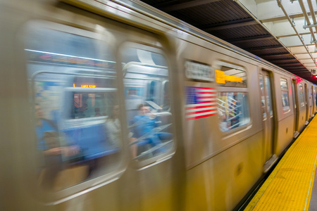 NEW YORK, USA - NOVEMBER 22, 2016: Times Square subway train moving underground in New York City USA.のeditorial素材