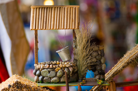 QUITO, ECUADOR- 07 MAY, 2017: Beautiful small watert well figure in a marketのeditorial素材