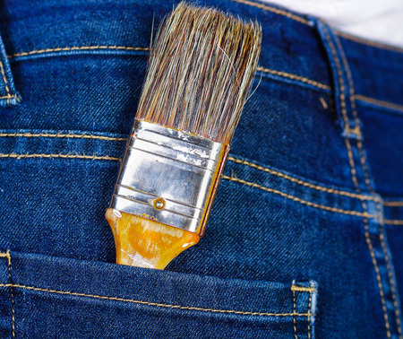 Small brush inside of jeans back pocketの写真素材