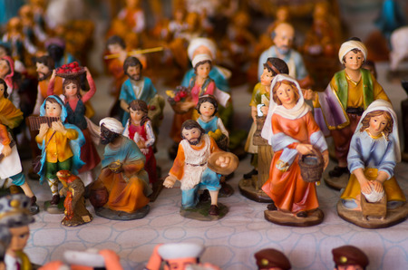 QUITO, ECUADOR- 07 MAY, 2017: Beautiful small figures made of clay over a white tableのeditorial素材