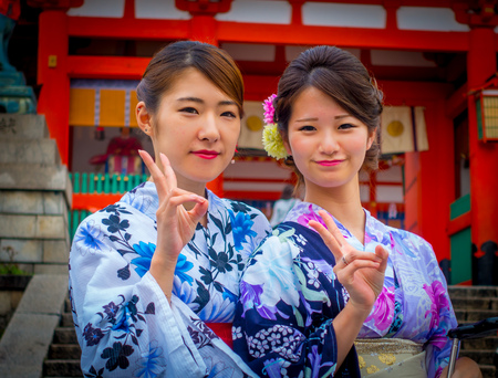 KYOTO JAPAN - NOVEMBER 24, 2016: Close up of tourists visit fushimi inari temple at rainy day in Kyoto, Japanのeditorial素材