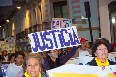 QUITO, ECUADOR- MAY 06, 2017: Unidentified group of women holding banners sign during a protest against the femicide in Quito Ecuadorのeditorial素材