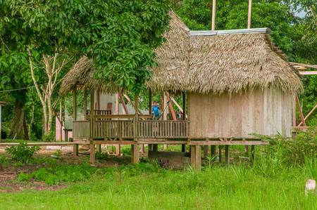 LAGO AGRIO, ECUADOR - NOVEMBER 17, 2016: Wooden house of siona community located inside of the amazon region in Cuyabeno Cuyabeno National Park, South America in Ecuadorのeditorial素材
