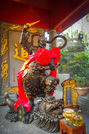 HONG KONG, CHINA - JANUARY 22, 2017: Stoned statue made of bronze at Wong Tai Sin temple enter in Hong Kong, China.のeditorial素材