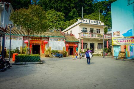 HONG KONG, CHINA - JANUARY 26, 2017: Unidentified people in old fishermen village Tai O with rustic houses in Hong Kong.のeditorial素材