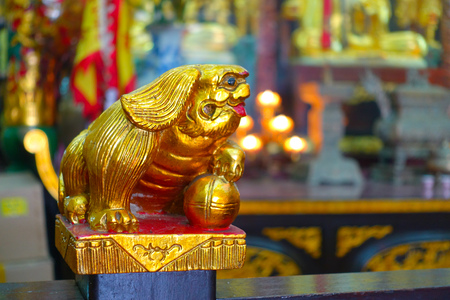 HONG KONG, CHINA - JANUARY 26, 2017: Tsz wan temple, with a hell representation, with a golden statue, in Hong Kong, China.のeditorial素材