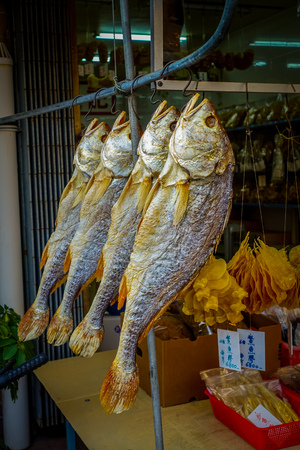 Fresh fish over a newspaper in a market in fishermen town in lantau, Hong Kong, China.の写真素材
