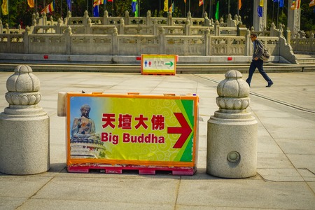 HONG KONG, CHINA - JANUARY 26, 2017: Informative sign in the entrance of the Tian Tin monastery in Lantau Island, Hong Kongのeditorial素材
