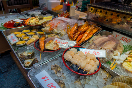 OSAKA, JAPAN - JULY 18, 2017: Seafood in a market in Kuromon Ichiba market on in Osaka, Japan. it is market places popular in Osaka, Japan.のeditorial素材