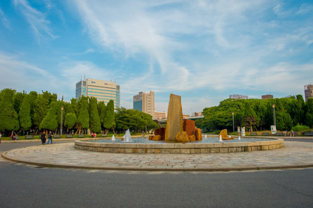 OSAKA, JAPAN - JULY 18, 2017: Beautiful fountain with rainbow in Osaka Castle Park.のeditorial素材
