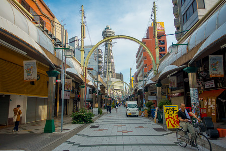 OSAKA, JAPAN - JULY 18, 2017: Tsutenkaku Tower is a tower and well-known landmark of Osaka. It is located in the Shinsekai district of Naniwa-ku, Osaka, Japan.のeditorial素材