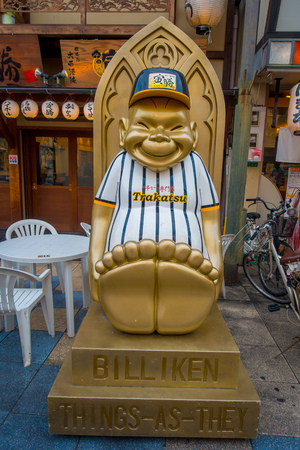 OSAKA, JAPAN - JULY 18, 2017: Billiken The God of Things As They Ought To Be Statue is everywhere in the Shinsekai districtのeditorial素材