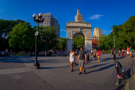 NEW YORK - JULY 22, 2017: Unidentified people enjoying the summer day in the Washington Square Park Arch, New Yorkのeditorial素材