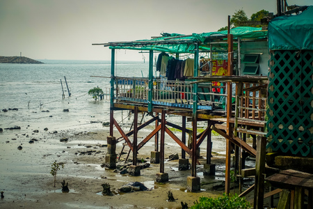 HONG KONG, CHINA - JANUARY 26, 2017: House over a metallic structure in old fishermen village Tai O with rustic houses in Hong Kongのeditorial素材