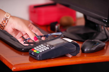Modern payment with new technology of payments using a smart watch and a glasses with chip, buy and...