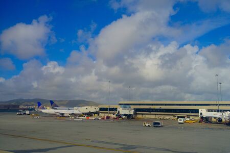 SAN FRANCISCO, CALIFORNIA - APRIL 13, 2014: United Airlines planes at the Terminal 3 in San Francisco International Airport.のeditorial素材