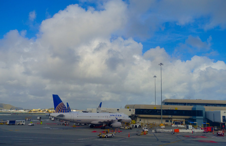 SAN FRANCISCO, CALIFORNIA - APRIL 13, 2014: United Airlines planes at the Terminal 3 in San Francisco International Airport.のeditorial素材