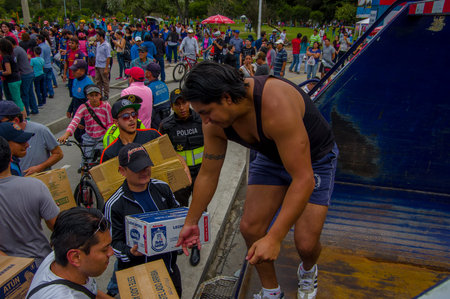 Quito, Ecuador - April,17, 2016: Unidentified citizens of Quito providing disaster relief food, clothes, medicine and water for earthquake survivors in the coastのeditorial素材
