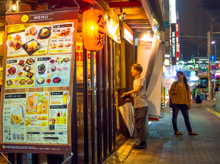 TOKYO, JAPAN JUNE 28 - 2017: Traditional back street bars in Shinjuku Golden Gai. Golden gai consists of 6 tiny alleys with 200 tiny bars and 20th century atmosphere, located in Tokyoのeditorial素材