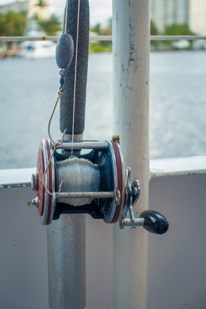 FORT LAUDERDALE, USA - JULY 11, 2017: Close up of a fishing rod in a big boat in the water at Fort Lauderdale, Floridaのeditorial素材