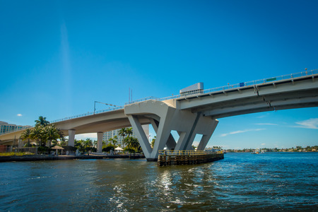 FORT LAUDERDALE, USA - JULY 11, 2017: Nice view of an opened draw bridge raised to let ship pass through at harbor in Fort Lauderdale, Florida.のeditorial素材