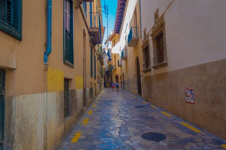PALMA DE MALLORCA, SPAIN - AUGUST 18 2017: Unidentified people walking in the streets in old city of Palma de Mallorca, Spainのeditorial素材