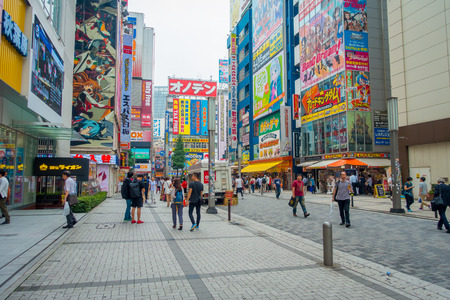 TOKYO, JAPAN JUNE 28 - 2017: Unidentified people walking in Akihabara district in Tokyo, Japan. The district is a major shopping area for electronic, computer, anime, gamesのeditorial素材